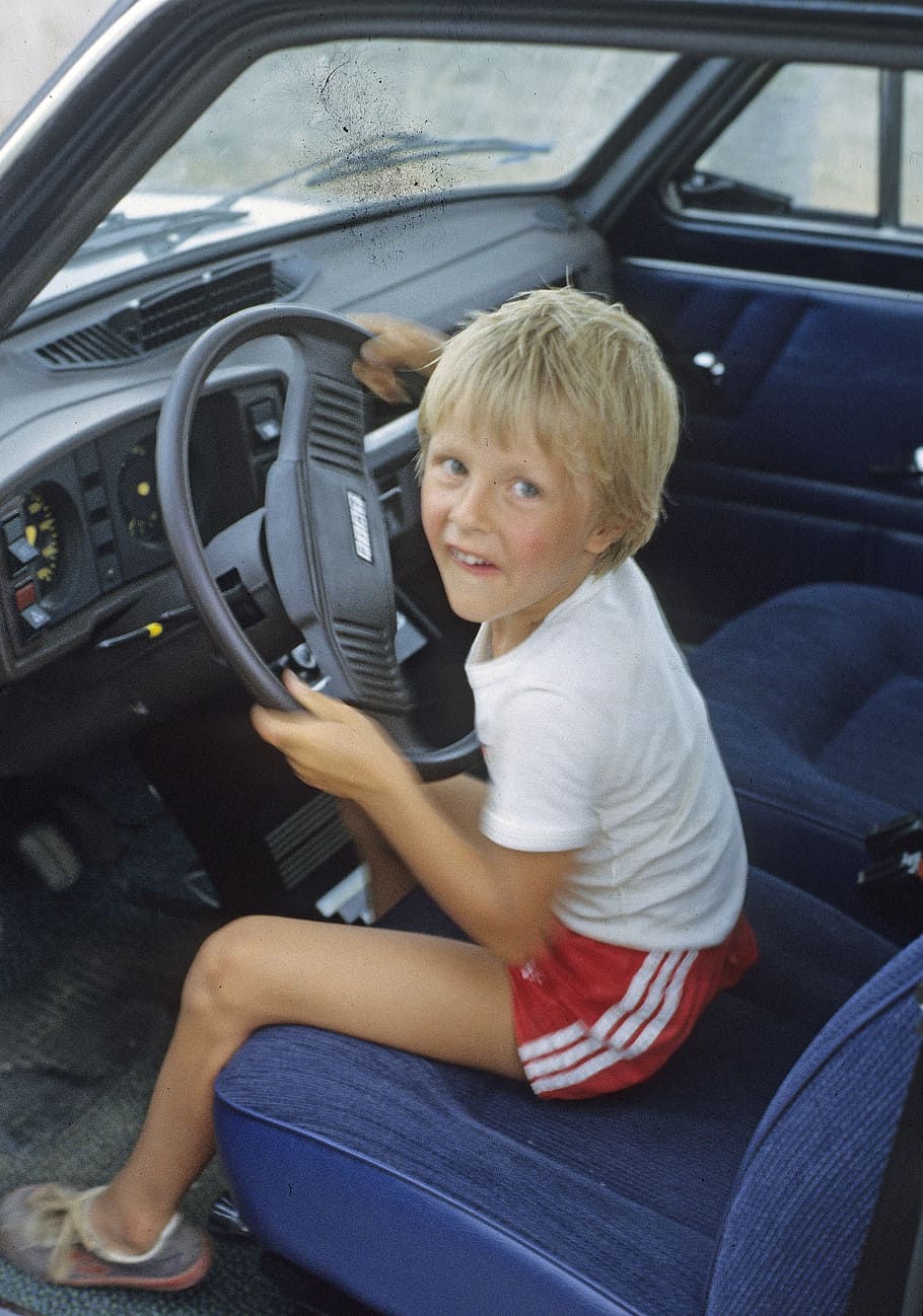 child, boy, auto, child car drives, the child tax, bub in the car, young leaves car, steering wheel, child on steering wheel, shorts