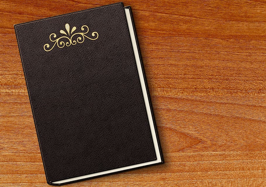 black leather journal, book, embossing, leather, empty, book cover, front and back covers, black, wood, wooden table