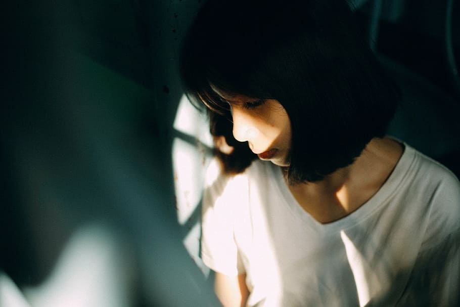 woman, wearing, white, v-neck shirt, blur, girl, light and shadow, model, pensive, one person