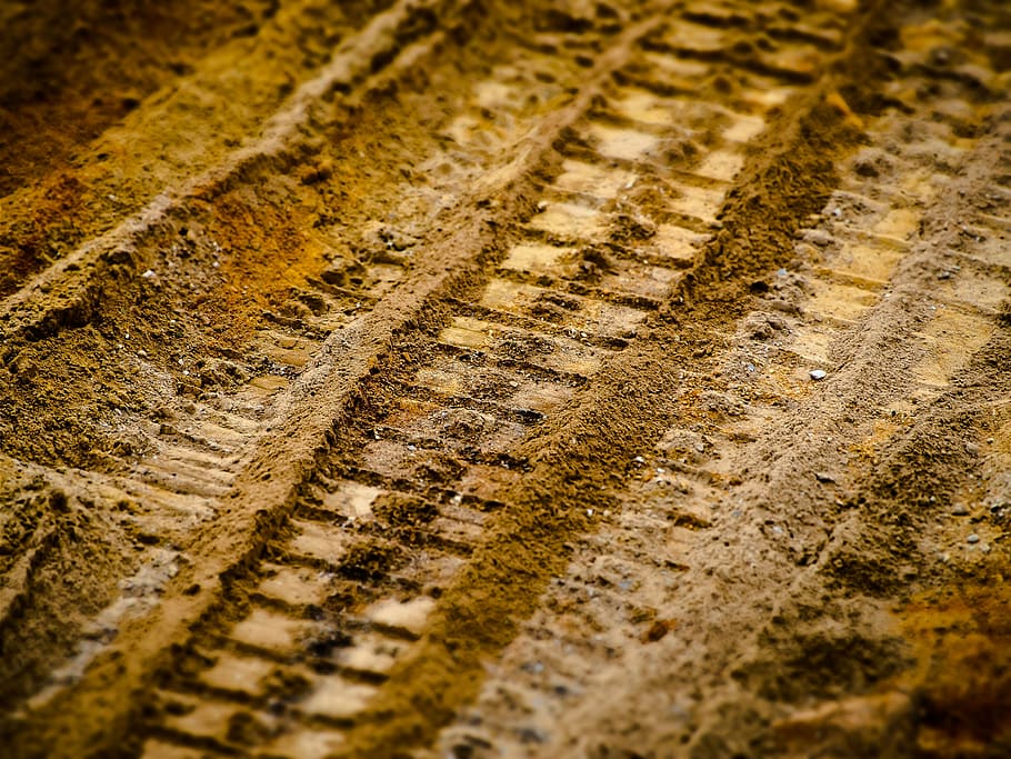 close-up photo, sands, sand, traces, tracks in the sand, reprint, site, tire tracks, caterpillar tracks, tilt shift