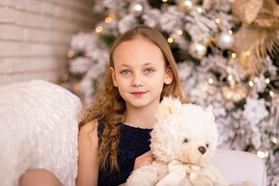 girl, holding, white, bear, plush, toy, sitting, sofa, child, kid