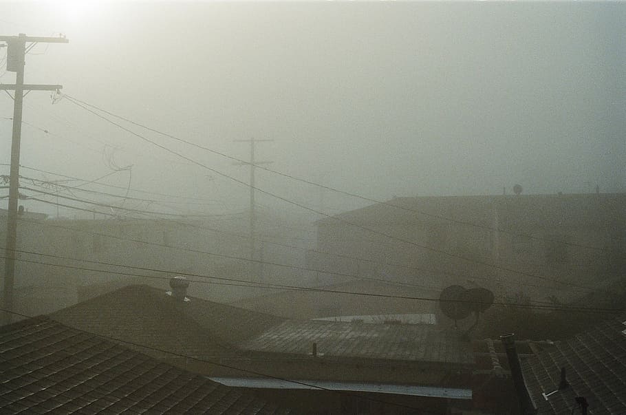 outdoor with fog, brown, galvanized, iron, sheet, fog, sky, rooftops, buildings, houses