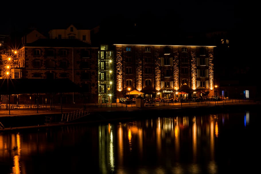lighted, concrete, building, body, water, reflective, photography, story, near, restaurant