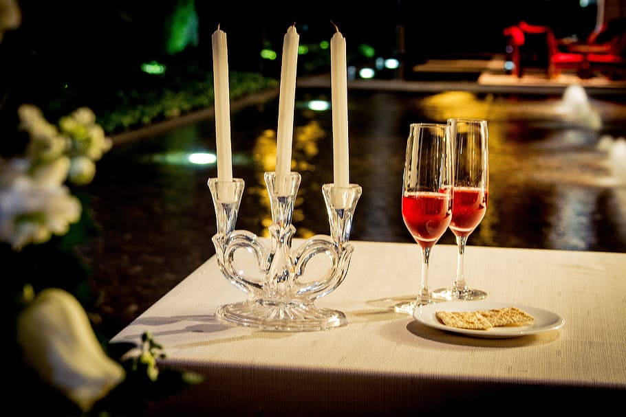 tilt-shift photography, candles, flute glasses, dinner, wine, love, toast, party, romantic, sailing
