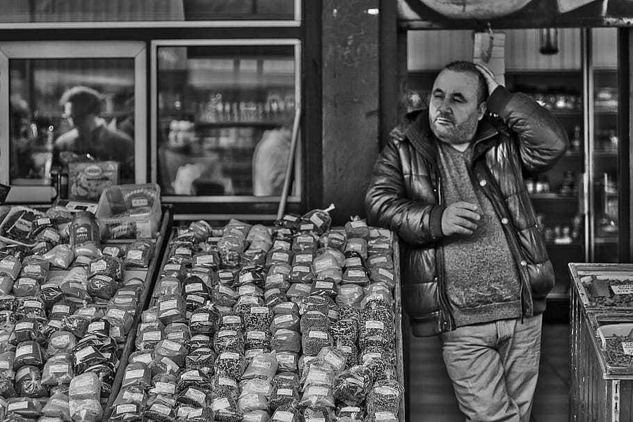 market, seller, black white, adult, one person, food and drink, real people, standing, men, mid adult