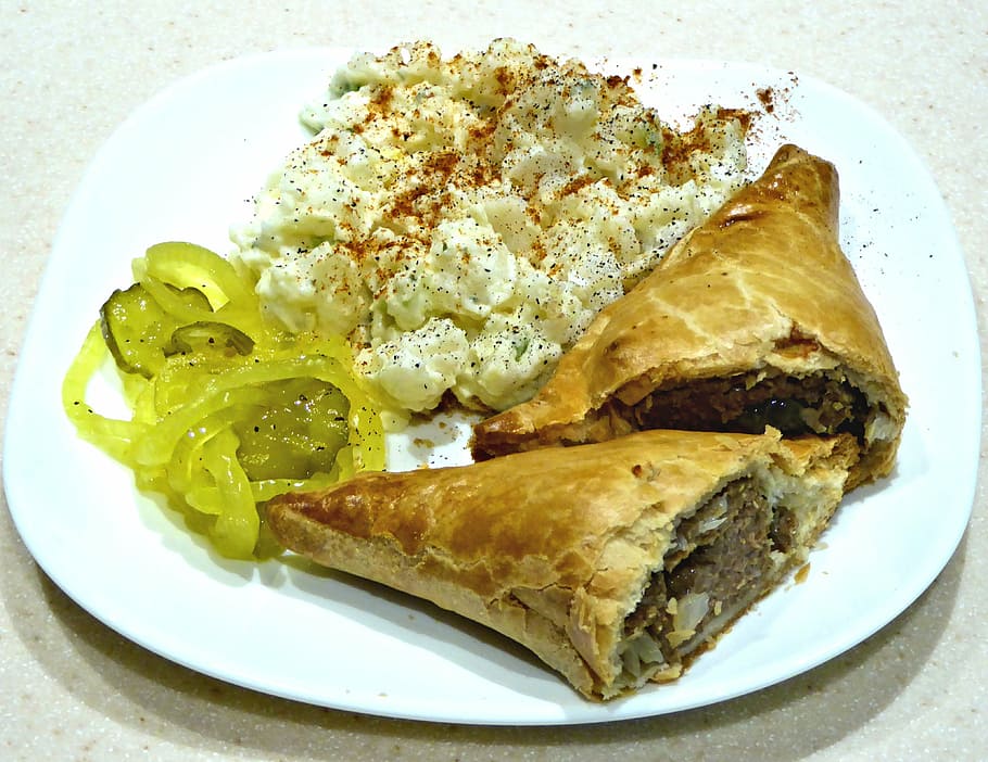 cornish pasty, potato salad, sweet pickles, ground beef, onions, pastry, food, ready-to-eat, plate, food and drink