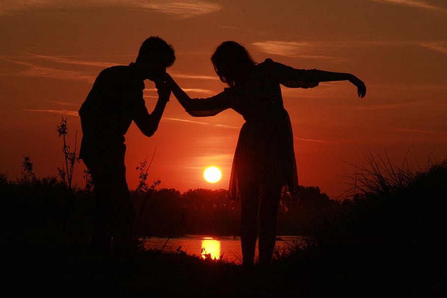 silhouettes photo, man, woman, couple, love, sunset, water, sun, shadow, romance