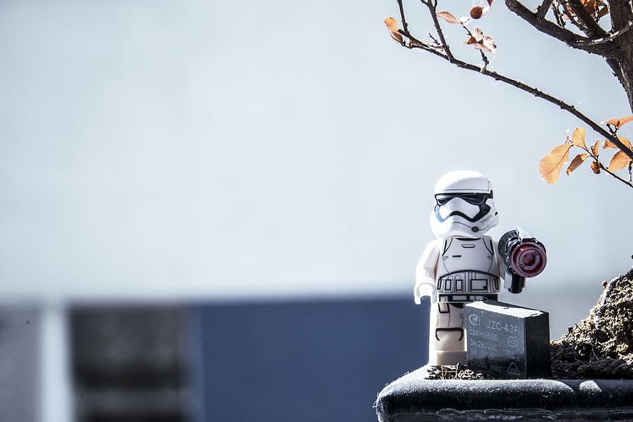 shallow, focus photography, storm trooper figure toy, robot, modern, technology, science, toy, outside, tree