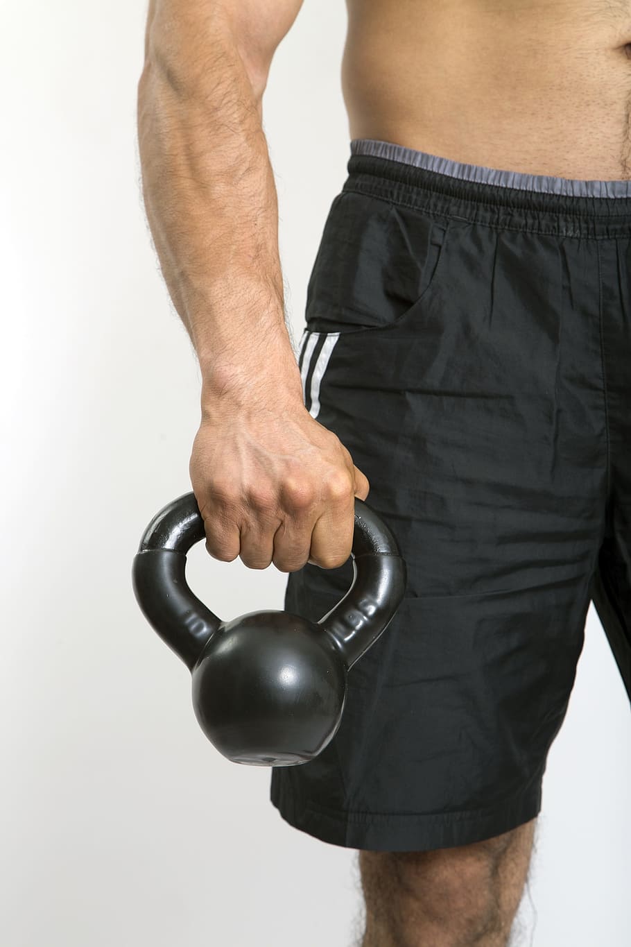 black kettle bell, kettlebell, arm, strong arm, sport, body, one person, men, white background, midsection