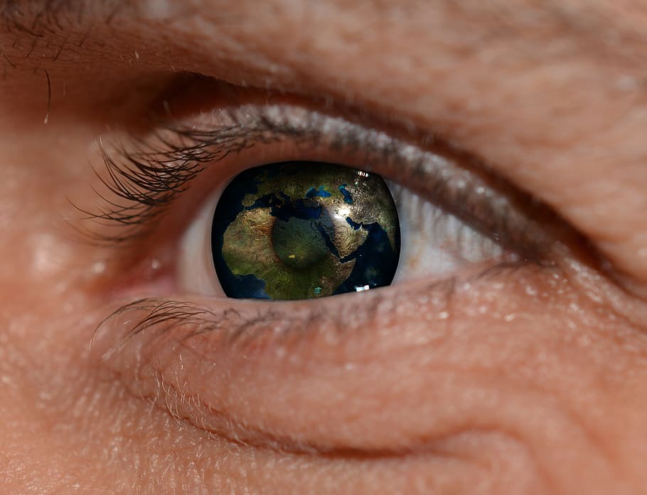 person's right eye, eye, man, pupil, lid, eyebrow, world, earth, globe, mirroring