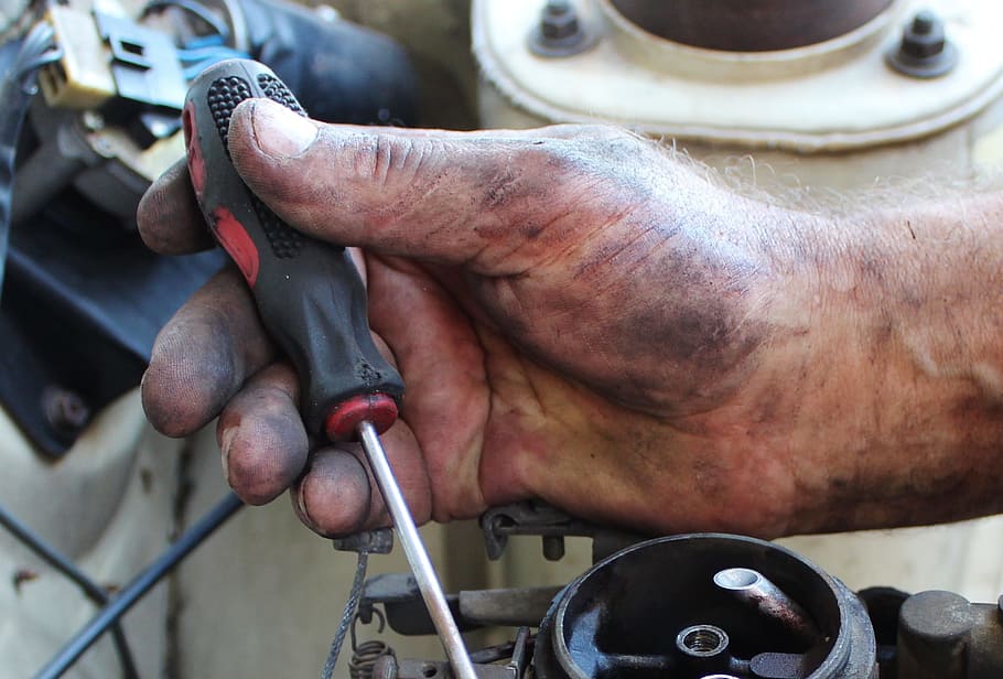 person, holding, black, red, screwdriver, hand, mechanic, carburetor, mount, mechanics