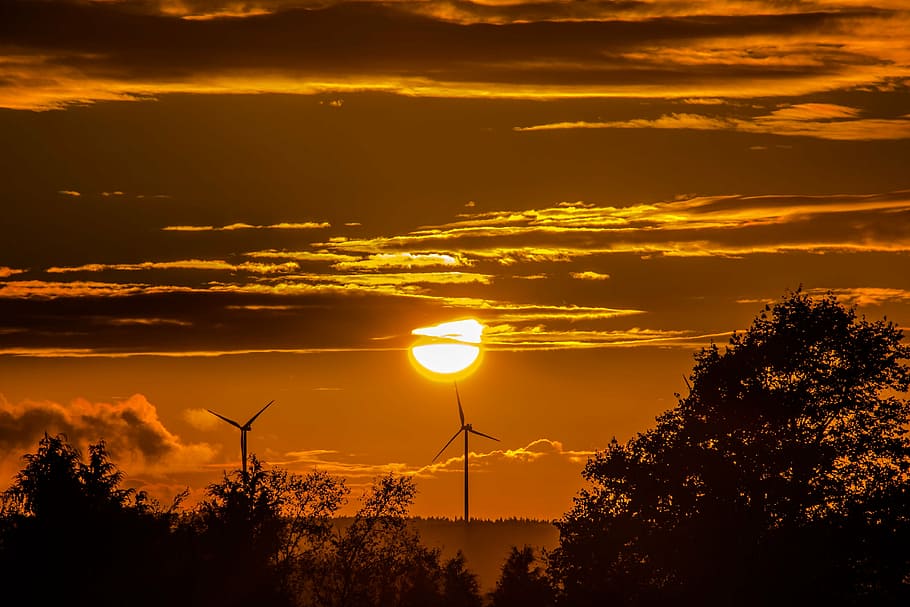 two, windmill turbines, clouds, golden, hour photography, sunset, sun, windräder, forest, trees