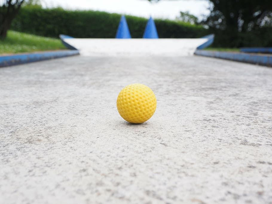 yellow, concrete, road, ball, mini golf ball, checkered, ball guide, miniature golf, minigolf plant, ground golf