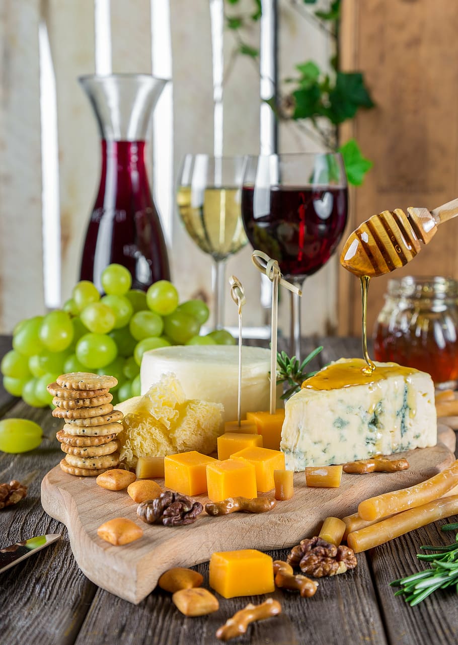 brown, wooden, board, cheese, biscuits, pouring, honey, table, cheese plate, wine