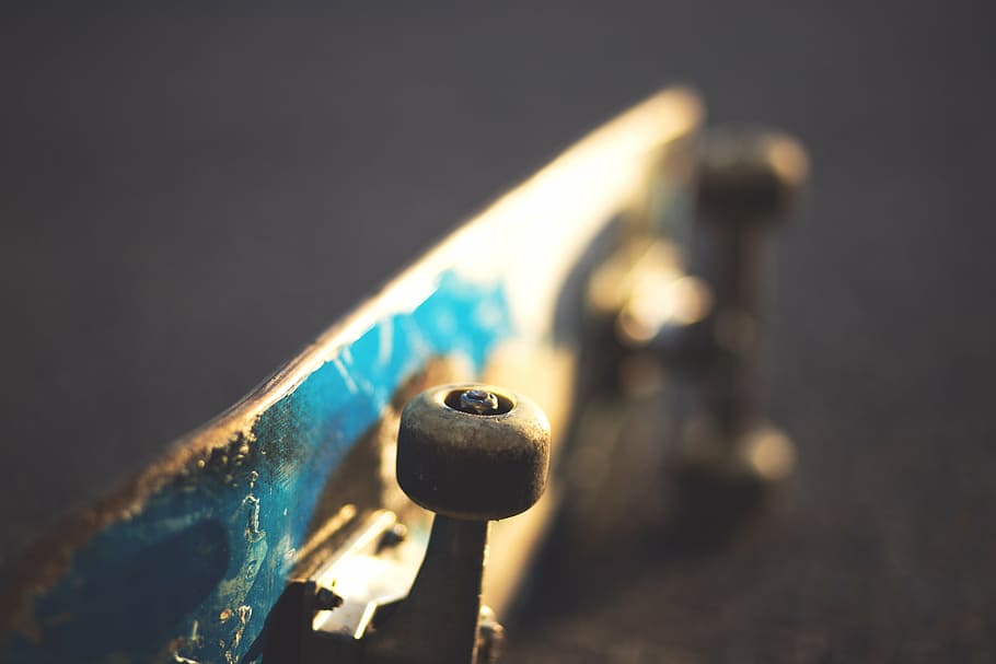 blue skateboard, macro, skateboard, sport, indoors, close-up, day, pool cue, focus on foreground, selective focus