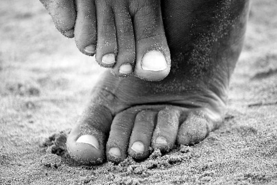 grayscale photograph, person, foot, stepping, sand, feet, sea, summer, nails, woman