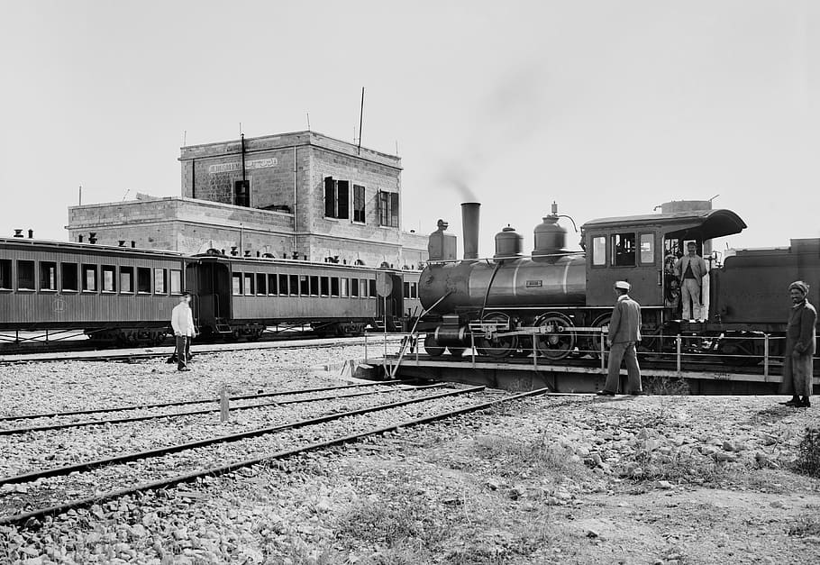 grayscale photo, man, standing, train, locomotive, steam locomotive, railway station, railway, seemed, jerusalem