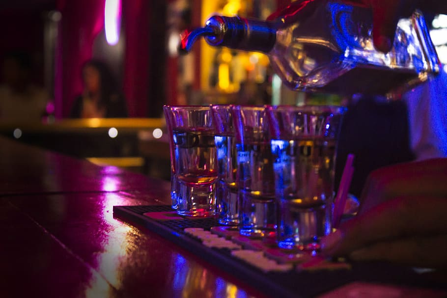 person, pouring, liquor, glasses, tequila, bar, cups, bar - drink establishment, alcohol, drink