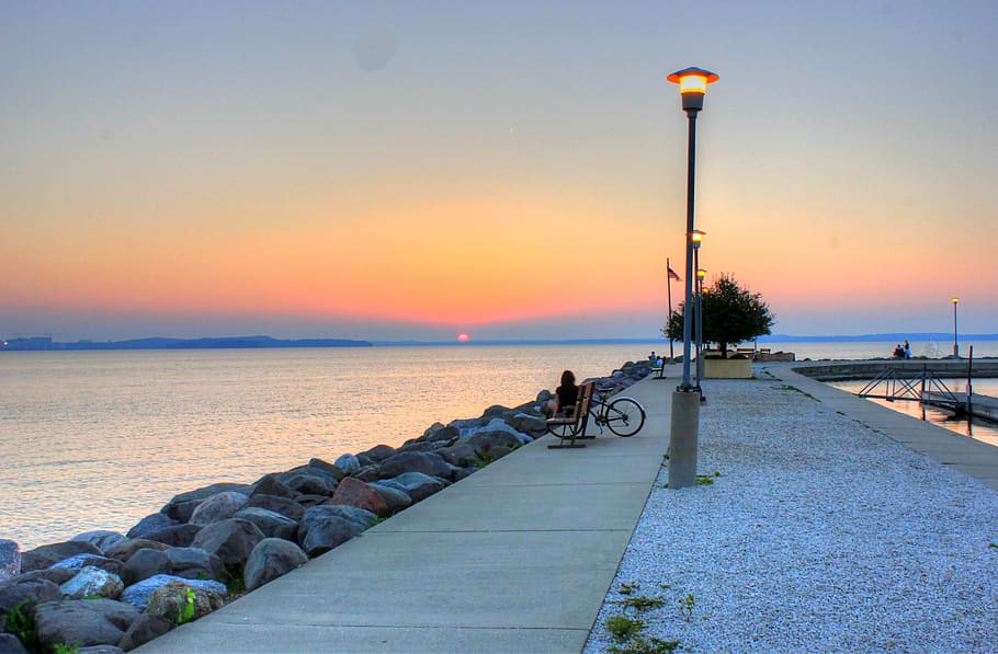 person, sitting, bench, facing, body, water, lake, girl, sunset, pier