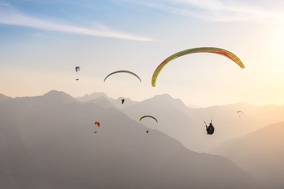 paragliding, sunset, flying, adventure, extreme sports, parachute, sky, mid-air, sport, leisure activity