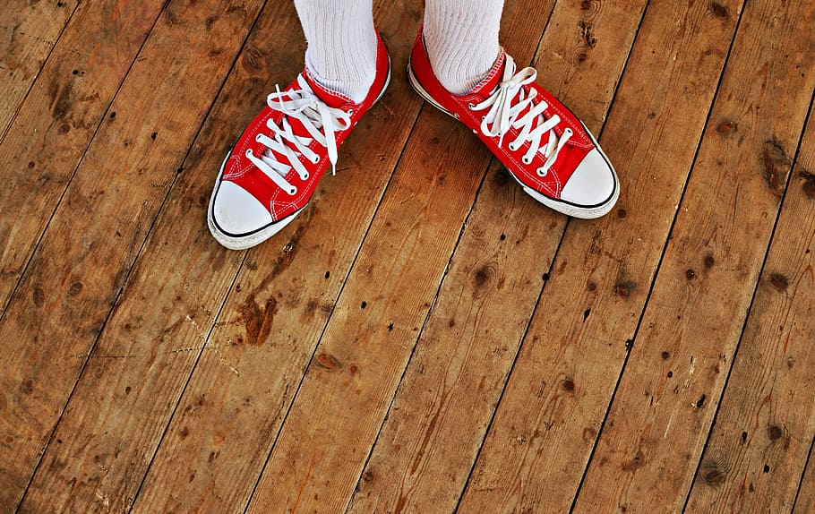 person, wearing, red-and-white, low-top sneakers, sneaker, shoe foot, footwear, leisure footwear, sock, female