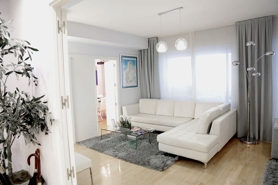 white, leather, sectional, sofa, front, window, sheer, gray, curtain, waiting room