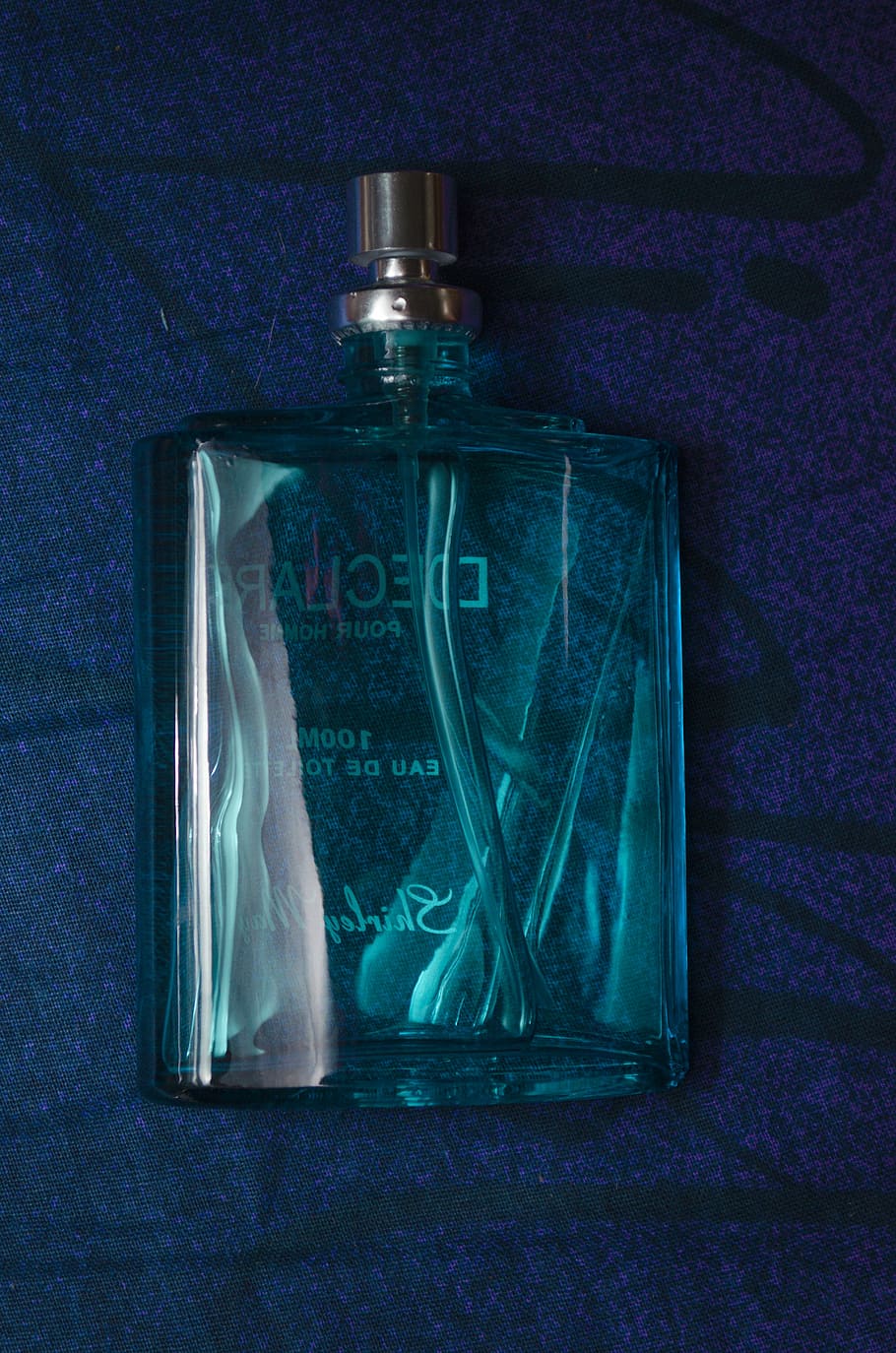 men's perfume, perfumes, blue, perfume, bottle, fragrance, indoors, healthcare and medicine, still life, transparent