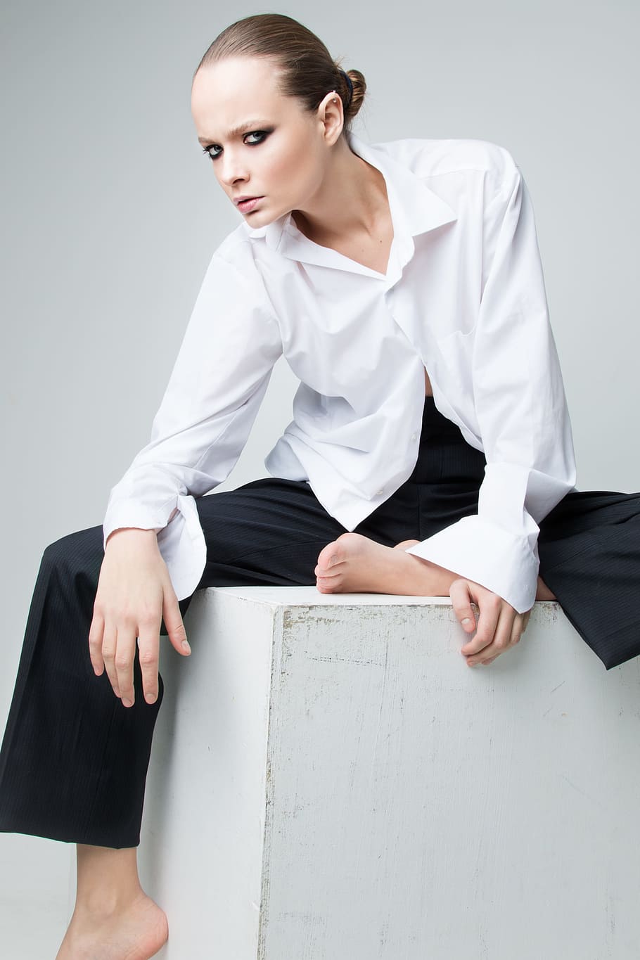 white dress shirt and black pants