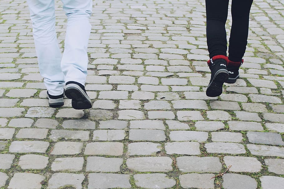 two, person, wearing, white, black, pants, sneakers, walking, pavement, legs