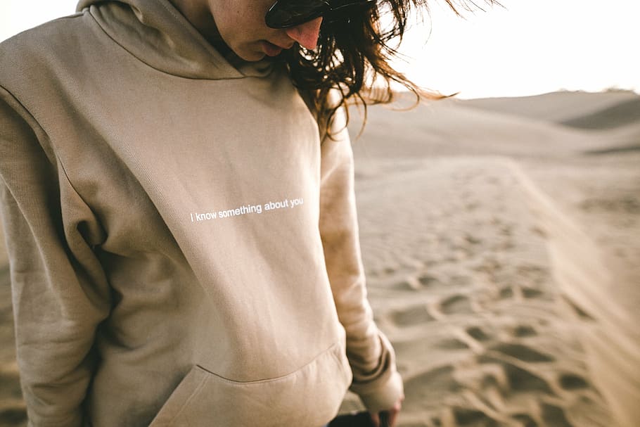 person, wearing, hoodie, standing, desert, people, statement, jacket, sand, statement jacket