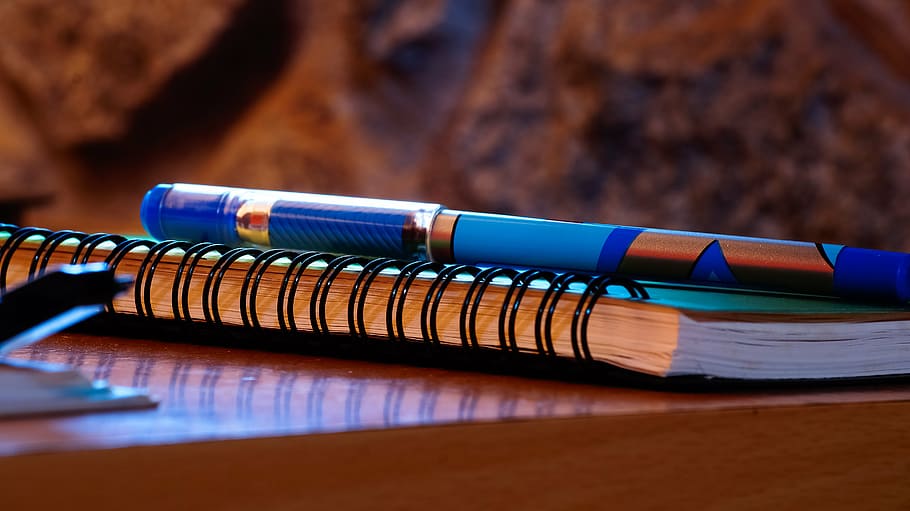 azul, naranja, bolígrafo, diario, personal, negocios, muro de piedra, fondo, cuaderno, oficina