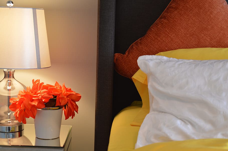 orange, petaled flowers, white, ceramic, pot, bed, pillow, lamp, bedside, pillows