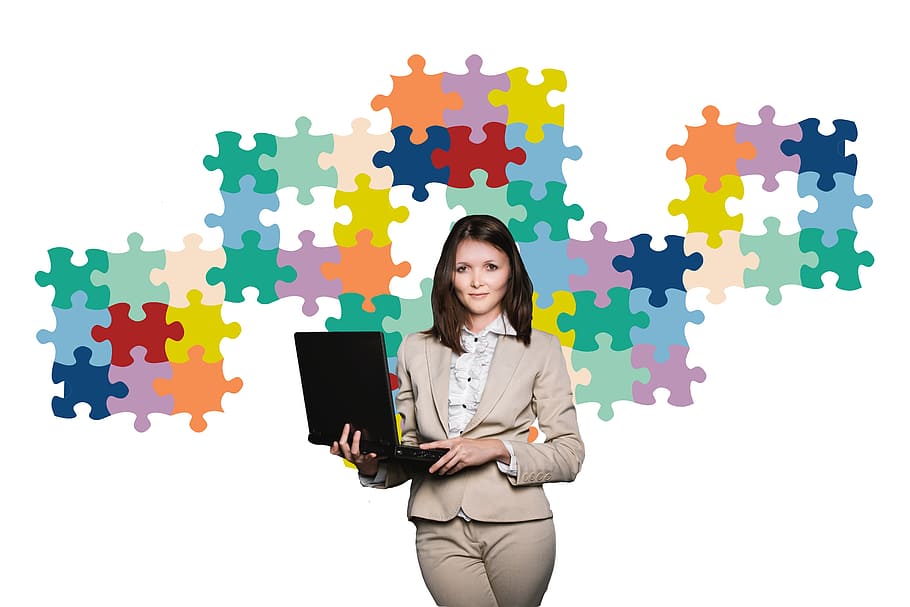 woman, wearing, beige, suit, holding, black, laptop computer, businesswoman, business, puzzle