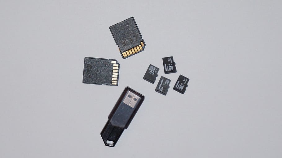 sd, micro sd, sd card, memory card, pny, usb stick, studio shot, indoors, gray, directly above