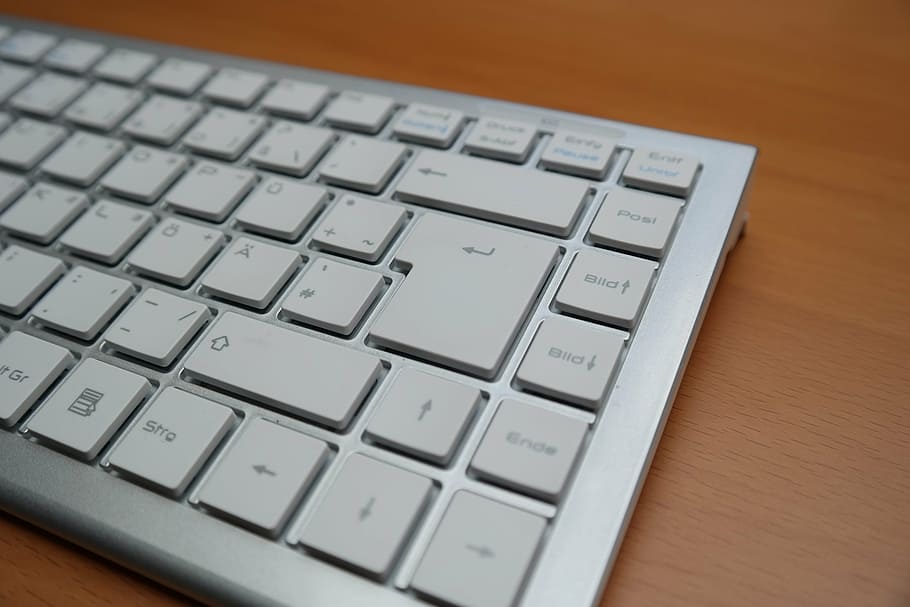 grey, keyboard, brown, wooden, surface, return key, return button, enter button, enter key, computer