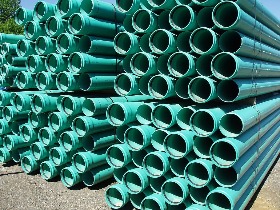 pile, teal pipe lot, green, plastic, pipes, culvert, water, sewage, pipe, large group of objects