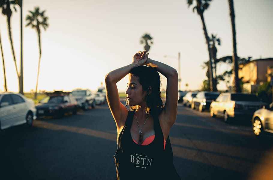 woman, standing, vehicles, Sunset, Women, Los Angeles, outdoors, front view, one person, focus on foreground