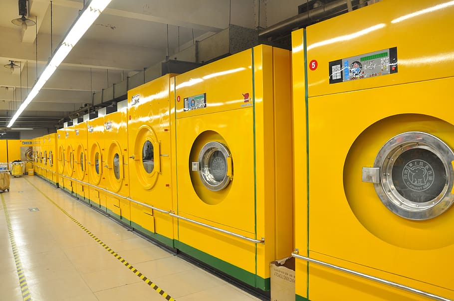 yellow front-load washers, shop, laundry, washing machine, big, yellow, clean, transportation, indoors, in a row