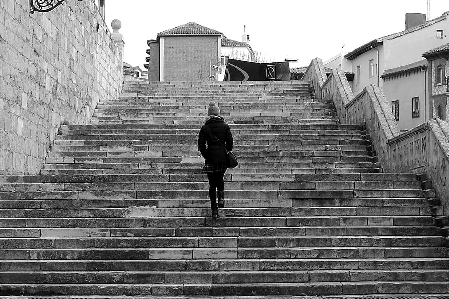 grayscale photography, person, concrete, stairs, people, outdoors, street, architecture, adult, wall