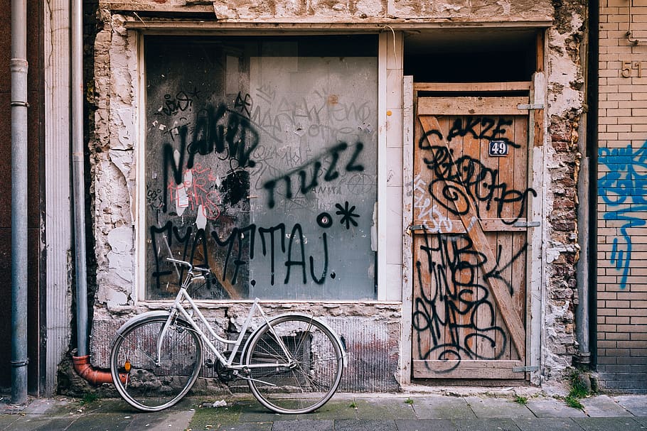 building, wall, door, wood, window, art, lettering, bike, bicycle, street