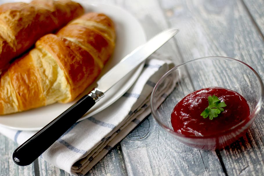croissants, pastries, pastry, jam, breakfast, food, knife, bowl, table, food and drink