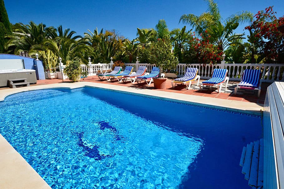 poolside, swimming pool, swimming, holiday, deckchairs, vacation, spain, spanish villa, swimming pools, resort