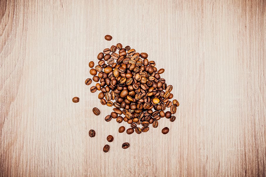 close-up photo, coffee bean lot, coffee, bean, seed, cafe, wood, table, brown, food and drink