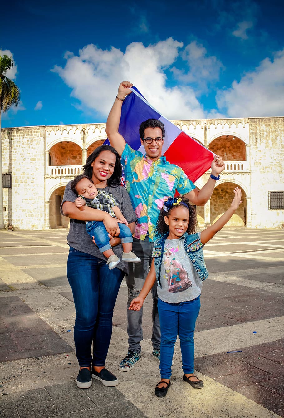 family picture, husband, holding, flag, france, daytime, parents, family, children, happiness