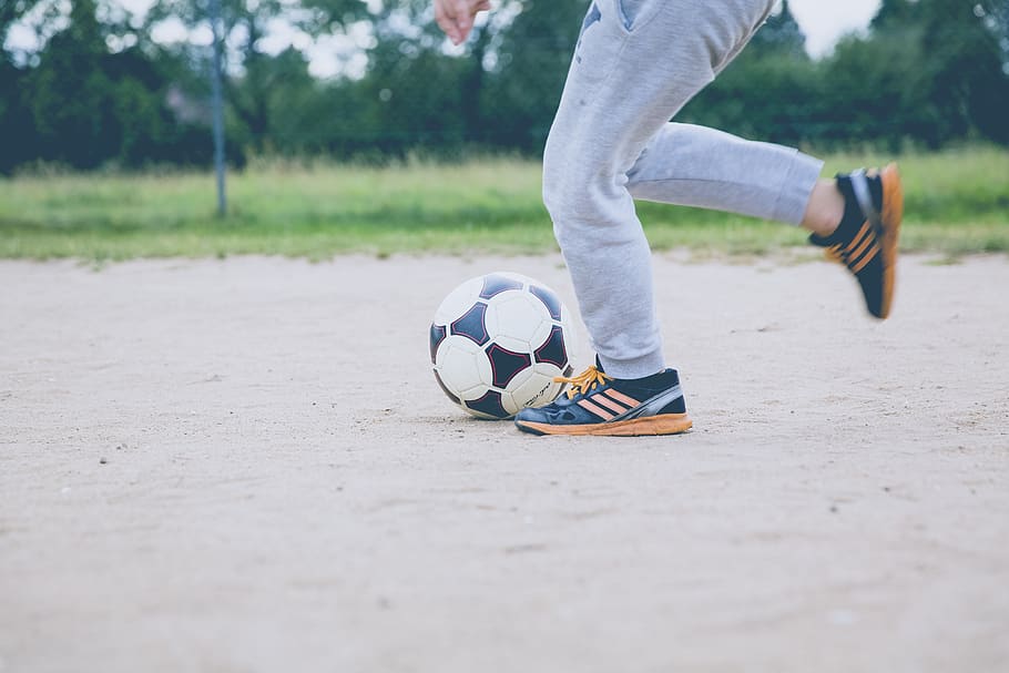 people, man, shoe, ball, soccer, sport, game, play, field, ground