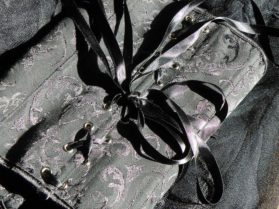 flower, pattern, the substance, black, corset, bows, high angle view, close-up, metal, day