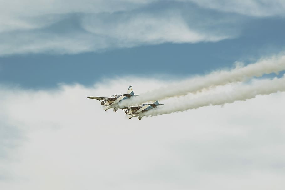 two, white, dog fighter planes, throwing, smoke, air, cloudy, skies, white dog, dog fighter