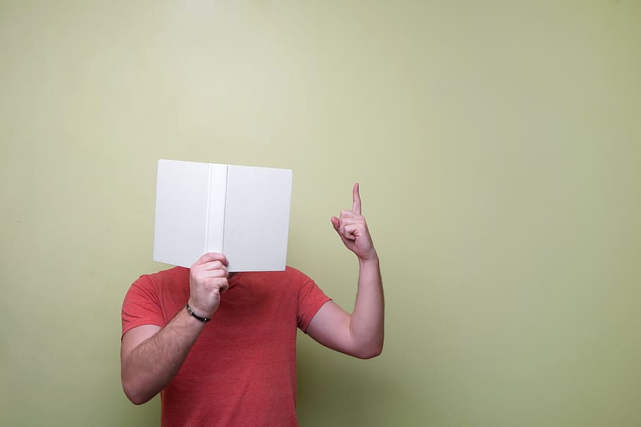 man, red, crew-neck, top, holding, paper, book, reading, guy, people
