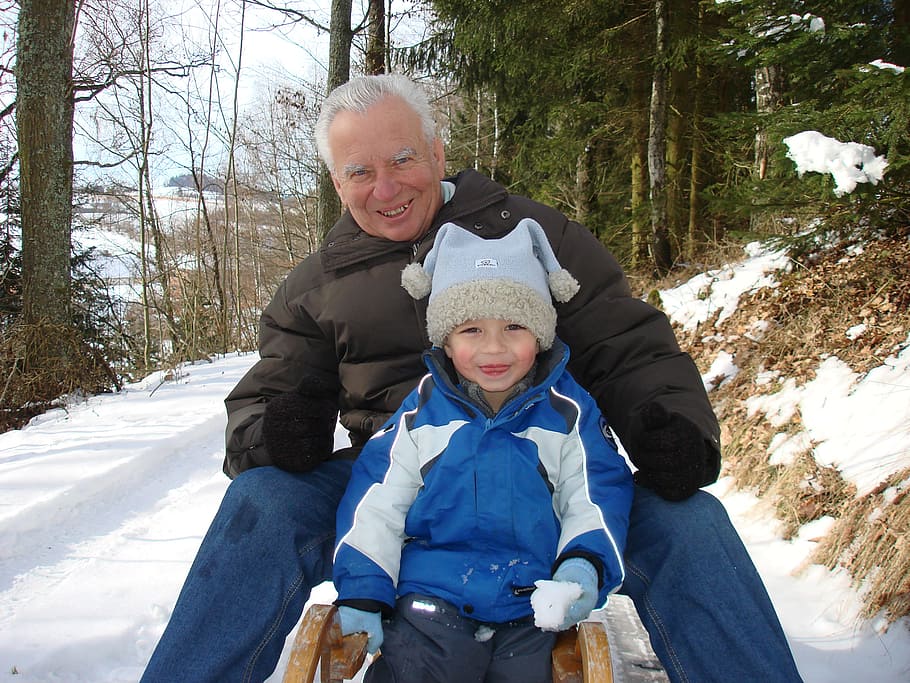 man, children, riding, snow sled, daytime, grandpa, senior, pensioners, child, slide