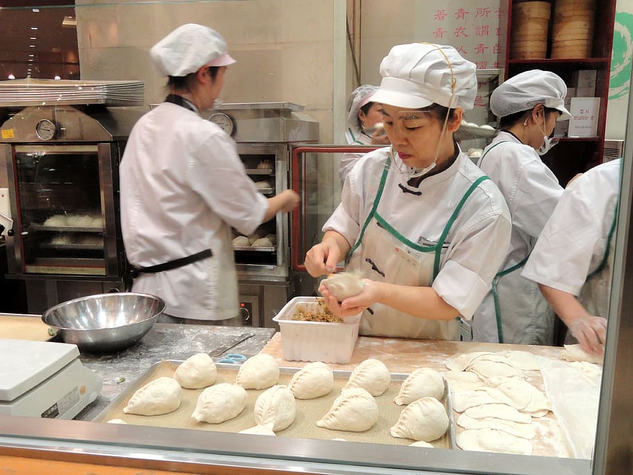 female, pastry chef molding dough, surrounded, cooking machines, pastry chef, molding, dough, cooking, machines, kitchen